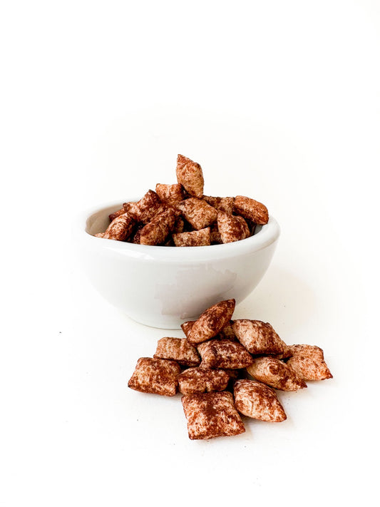 1 kg de cubitos de avena rellenas de chocolate semiamargo con mascabado espolvoreadas con cocoa sin azúcar